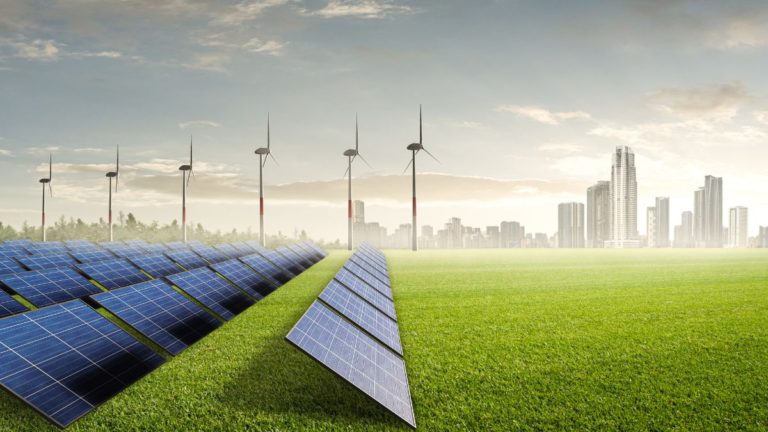 A solar farm generating renewable energy at sunset